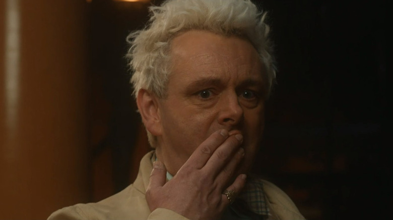 Aziraphale covering his mouth