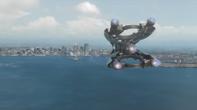 The Guardians's ship flies over a city