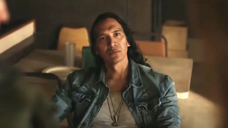 Greyeyes looking stoic