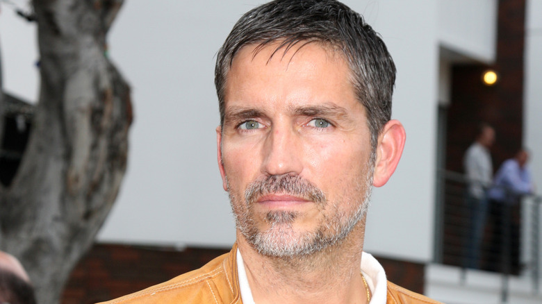 Jim Caviezel in tan jacket