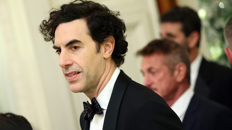 Sacha Baron Cohen looking to the side