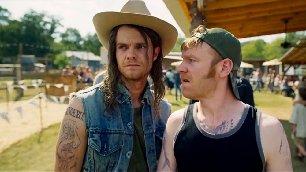 Jack Quaid and Brian Gleeson in Logan Lucky