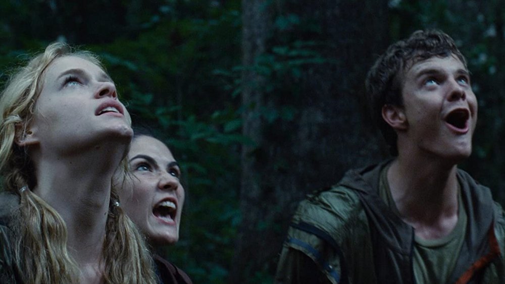 Leven Rambin, Isabelle Fuhrman and Jack Quaid in The Hunger Games