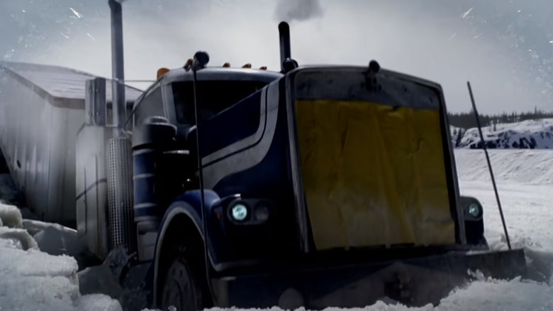 A truck plunges though the ice