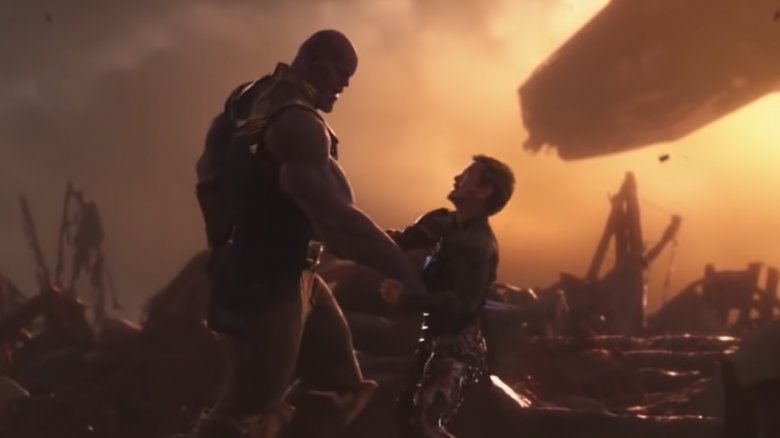 Thanos stabs Iron Man