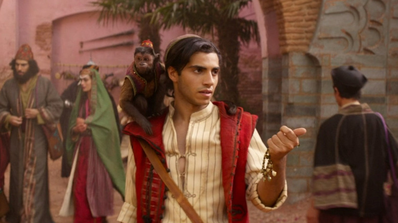 Aladdin and Abu stealing a necklace