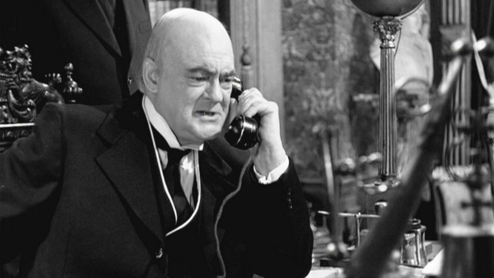 Mr. Potter (Lionel Barrymore) answers the phone in It's a Wonderful Life