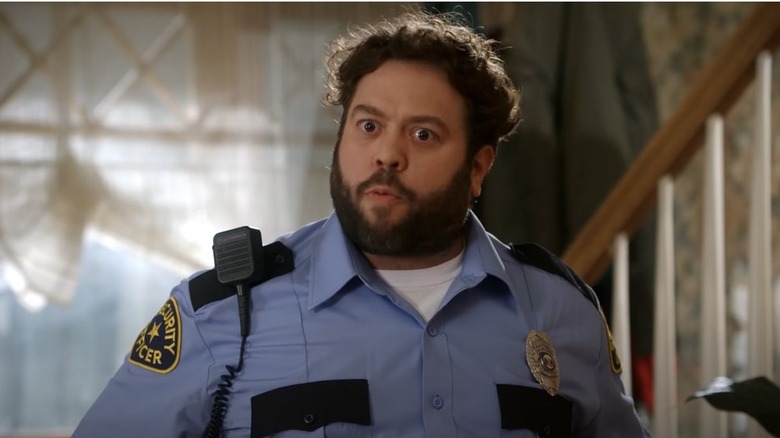 Dan Fogler wearing a security uniform