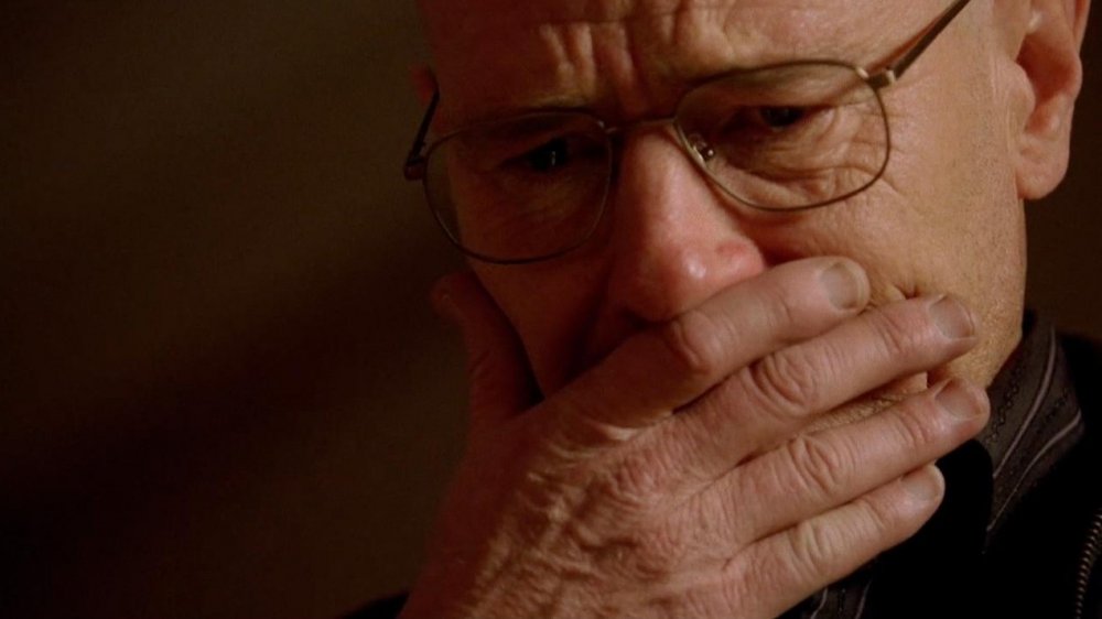 Bryan Cranston as Walter White covers his mouth in horror while watching Jane die (not pictured) in Breaking Bad