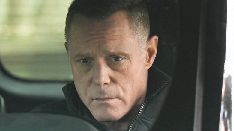 Voight sitting in a car