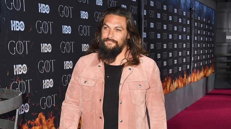 Jason Momoa walking at GOT event