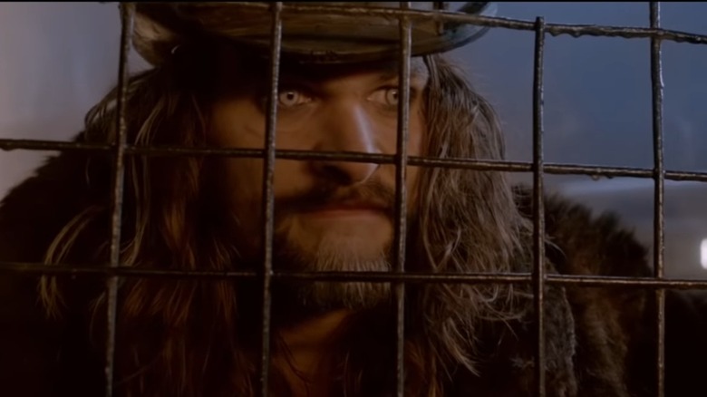 Jason Momoa in a cage