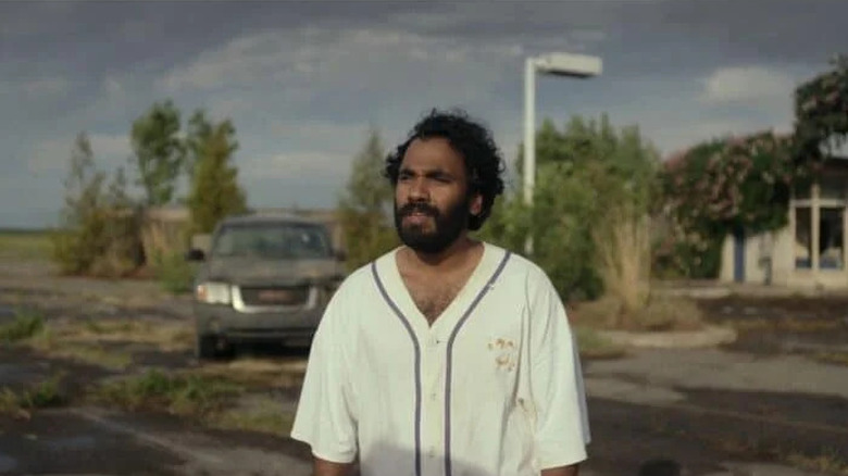 Sayid wearing stained baseball shirt