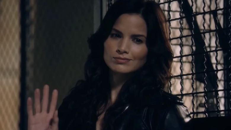 Katrina Law smiling and waving