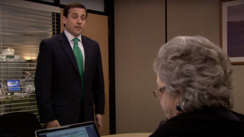 Michael Scott and Jo talking