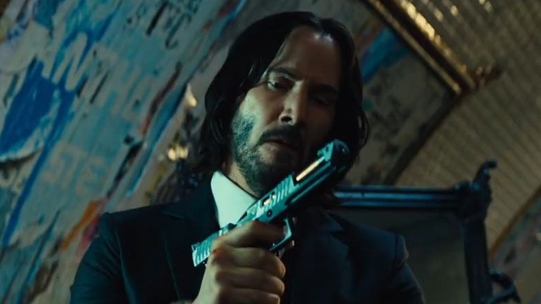 Reeves with a gun