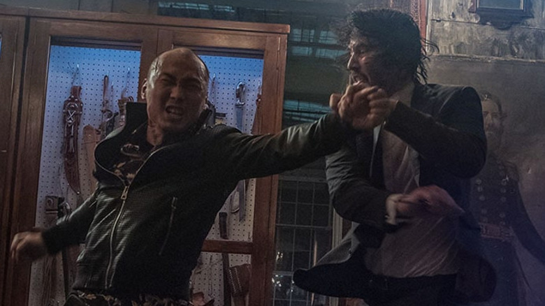 Reeves mid-fight in "John Wick 3"