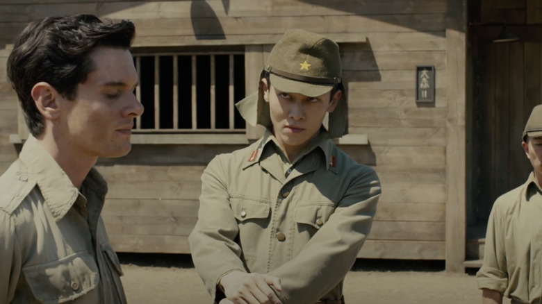 Miyavi and Jack O'Connell talking in Unbroken 