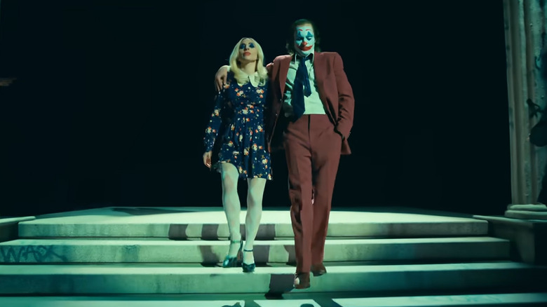 Joker and Harley walking down steps