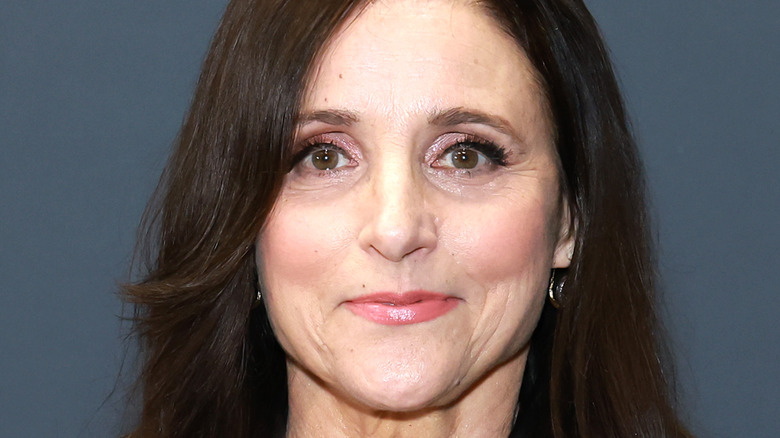 Julia Louis-Dreyfus looks at camera