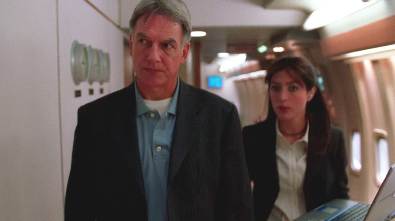 Gibbs and Kate, an airplane corridor