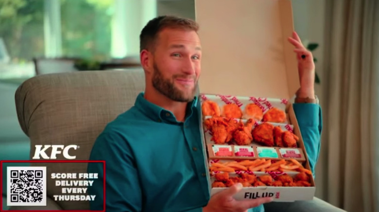 Kirk Cousins holding KFC chicken