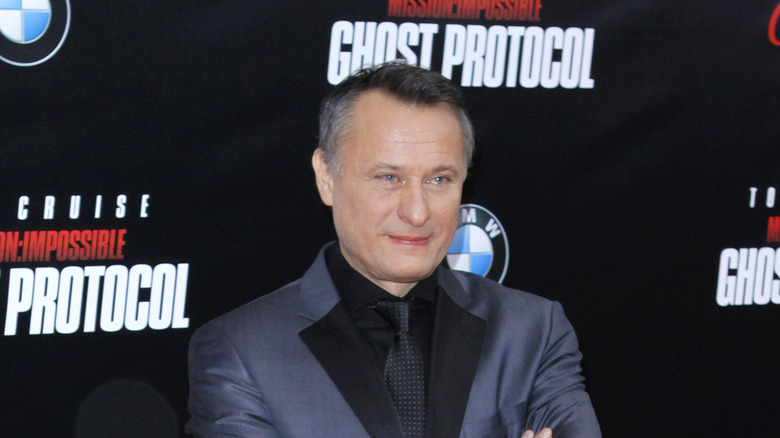 Michael Nyqvist poses at event