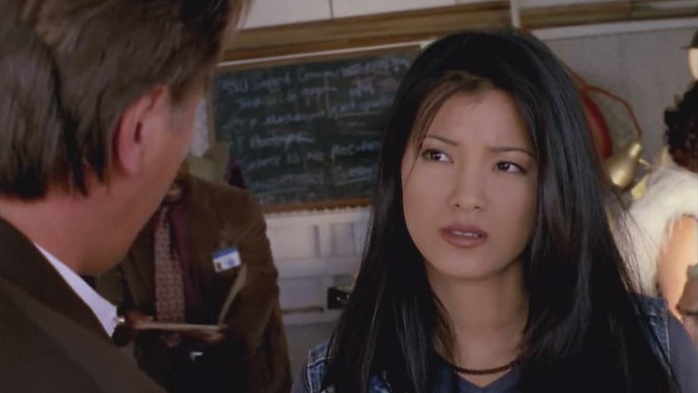 Inspector Michelle Chan in denim jacket