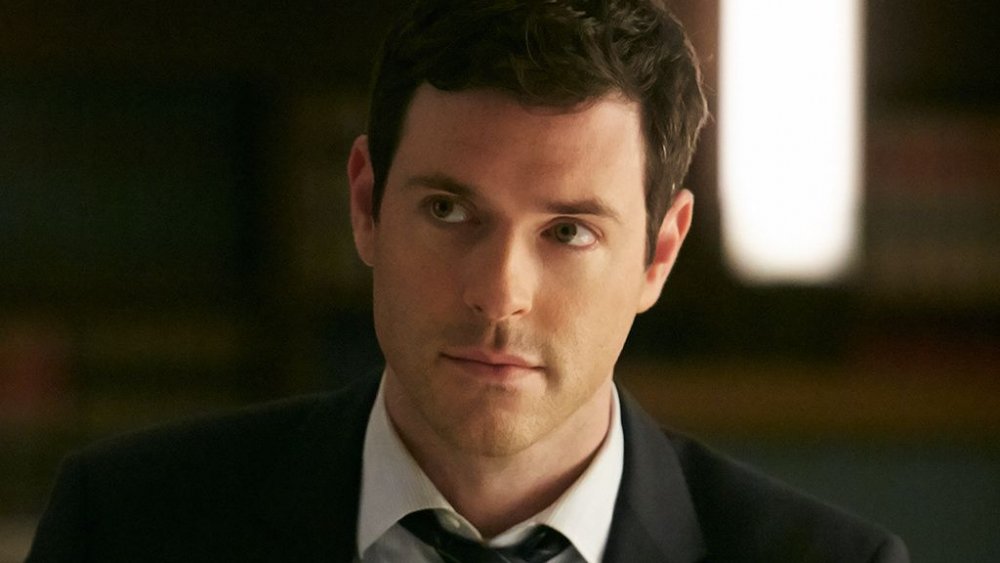 Brendan Hines as Logan Sanders in Suits