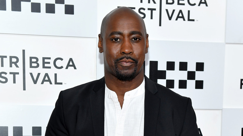 D.B. Woodside looking forward black jacket 