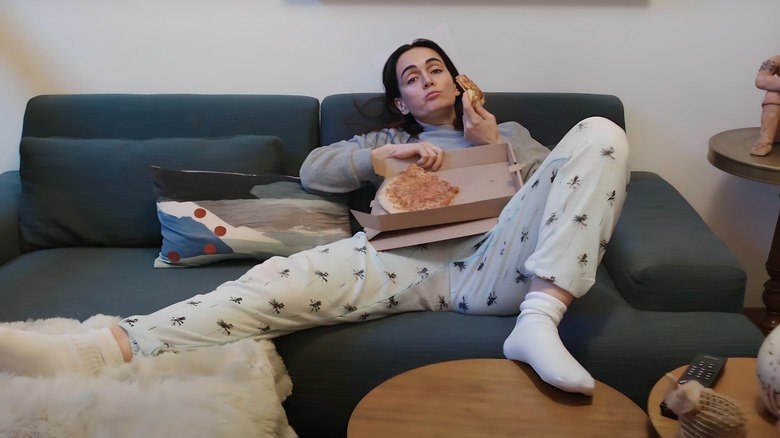 Ana eating a pizza 