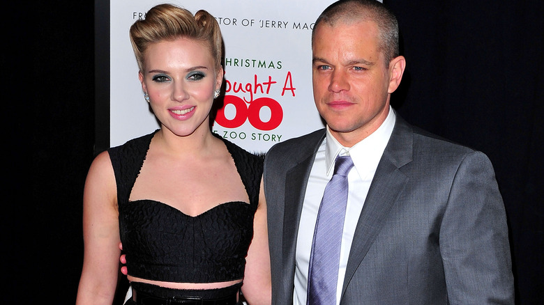 Matt Damon posing with Scarlett Johansson