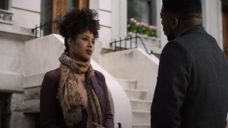 Margot Bingham talking on the sidewalk