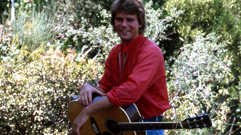 Richard Dean Anderson in woods