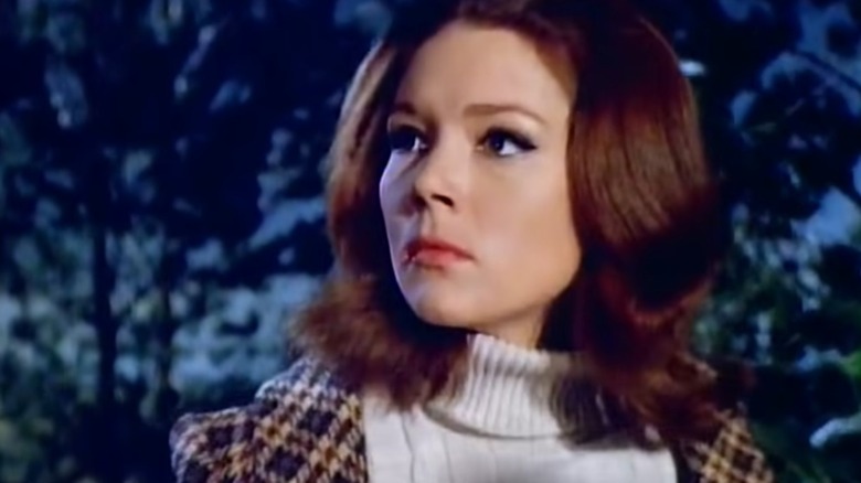 Emma Peel wearing a turtleneck