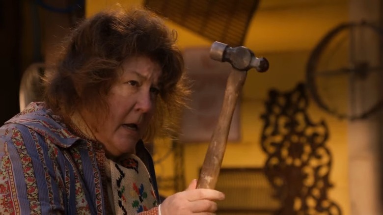 Mags Bennett holding a hammer