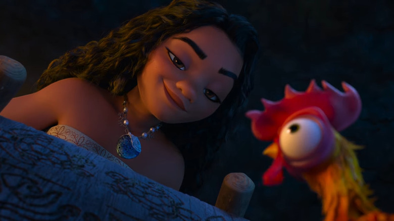 Moana looking at Heihei