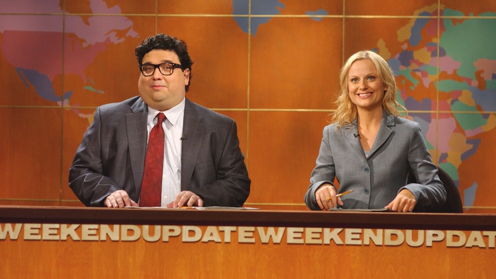 Horatio Sanz and Amy Poehler doing Weekend Update on SNL