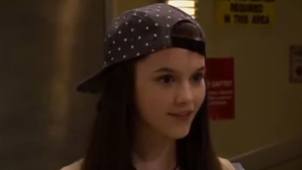 Chloe East as "Val Wishart'' 