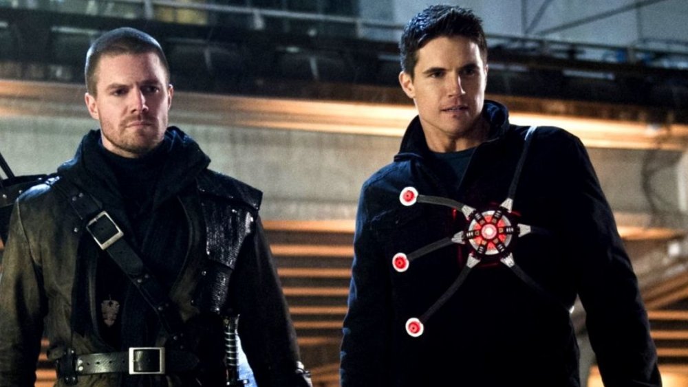 Robbie Amell as Firestorm alongside cousin Stephen Amell as Green Arrow