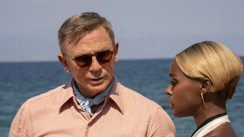 Daniel Craig and Janelle Monáe talking