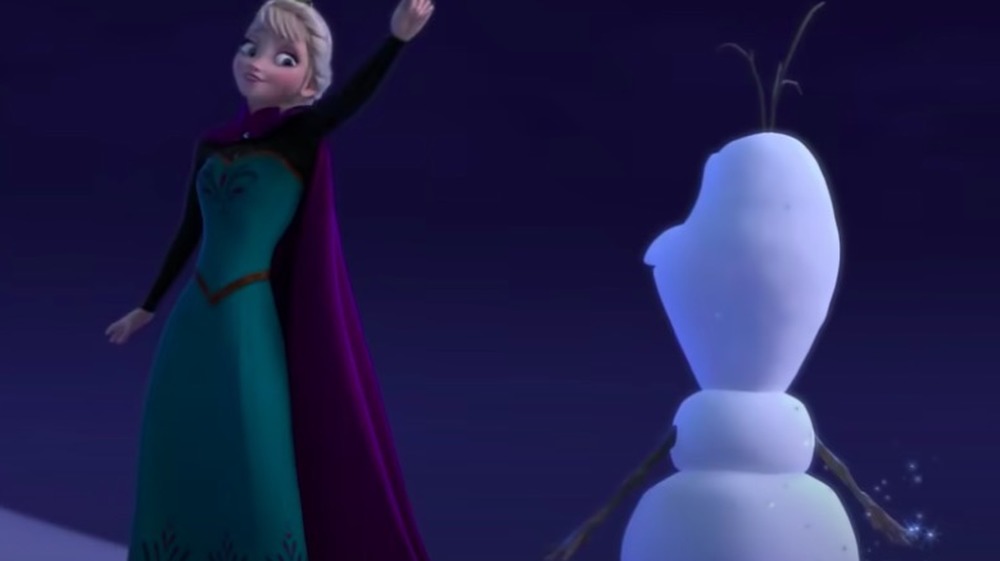 Elsa recreates Olaf as she sings "Let it Go" in Frozen