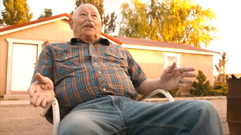 Barry Corbin sitting down and talking