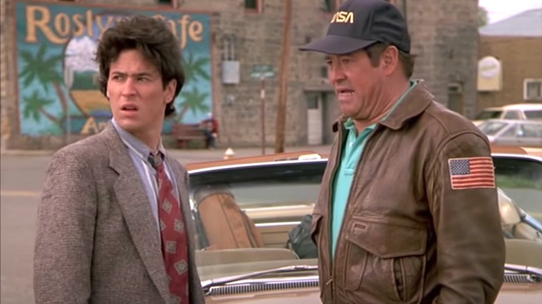 Barry Corbin wearing a NASA hat and leather jacket in Northern Exposure