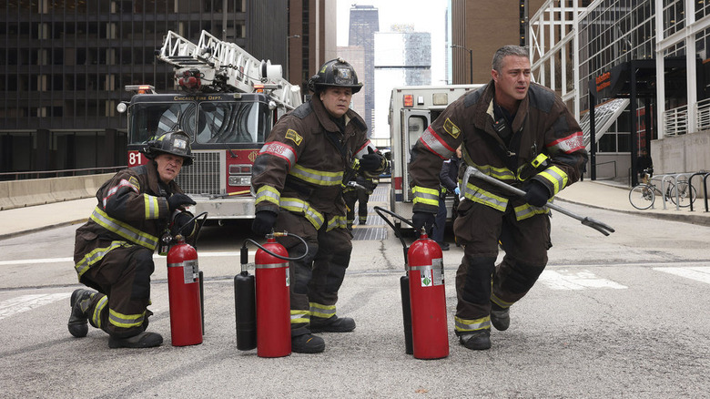 Severide, Tony, and Capp fighting fire