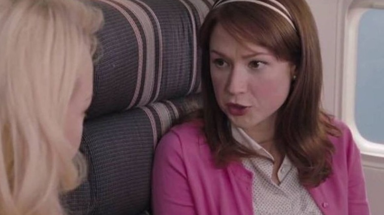 Ellie Kemper in Bridesmaids on plane