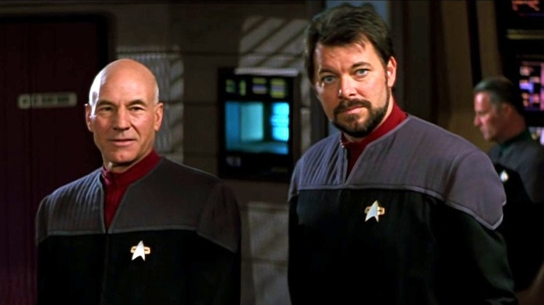 Picards stands next to Riker