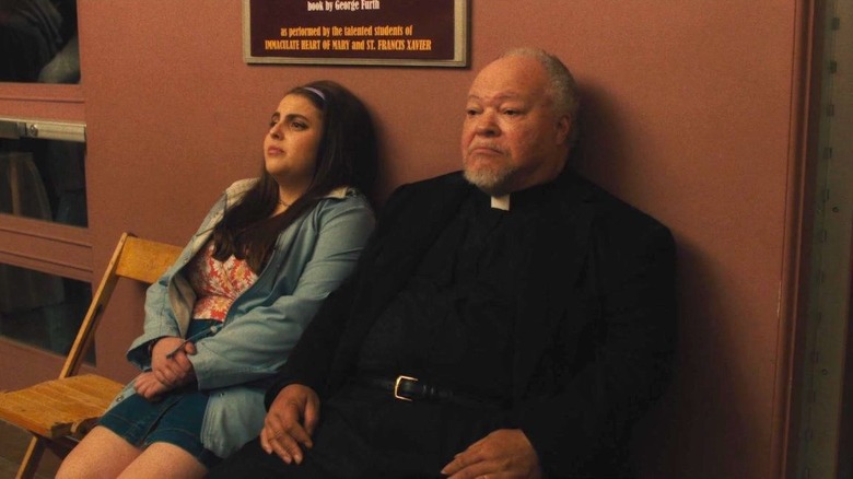 Father Leviatch looking upset