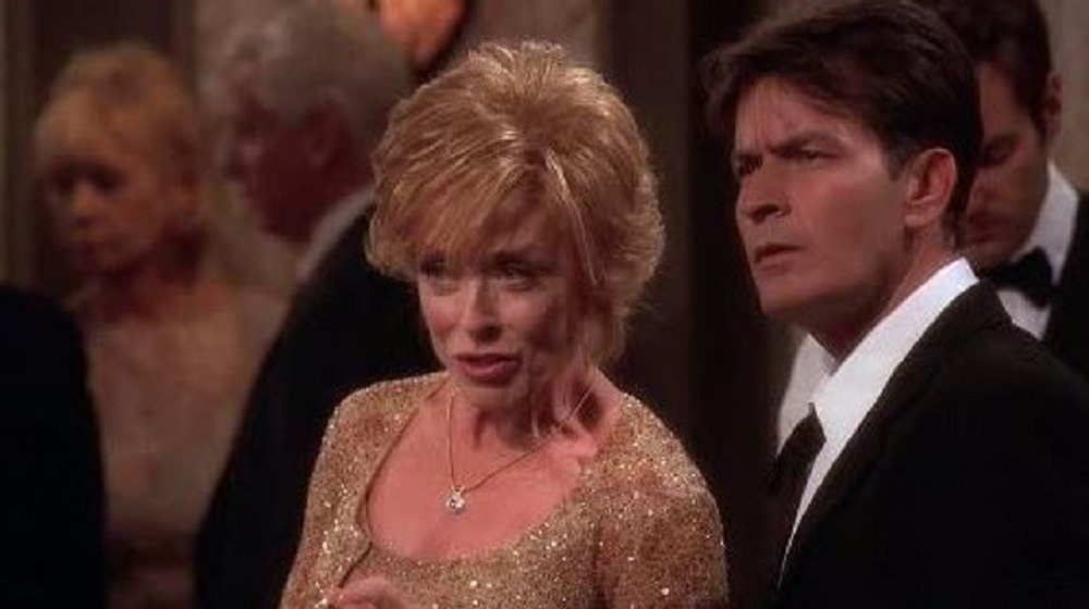 Evelyn Harper and Charlie Harper at a gala