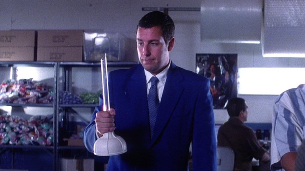 Adam Sandler with novelty plunger